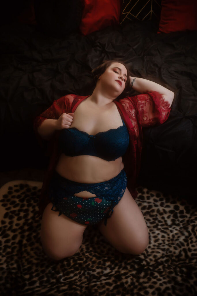 curvy woman in navy lingerie feeling empowered Lingerie Boutique Dallas